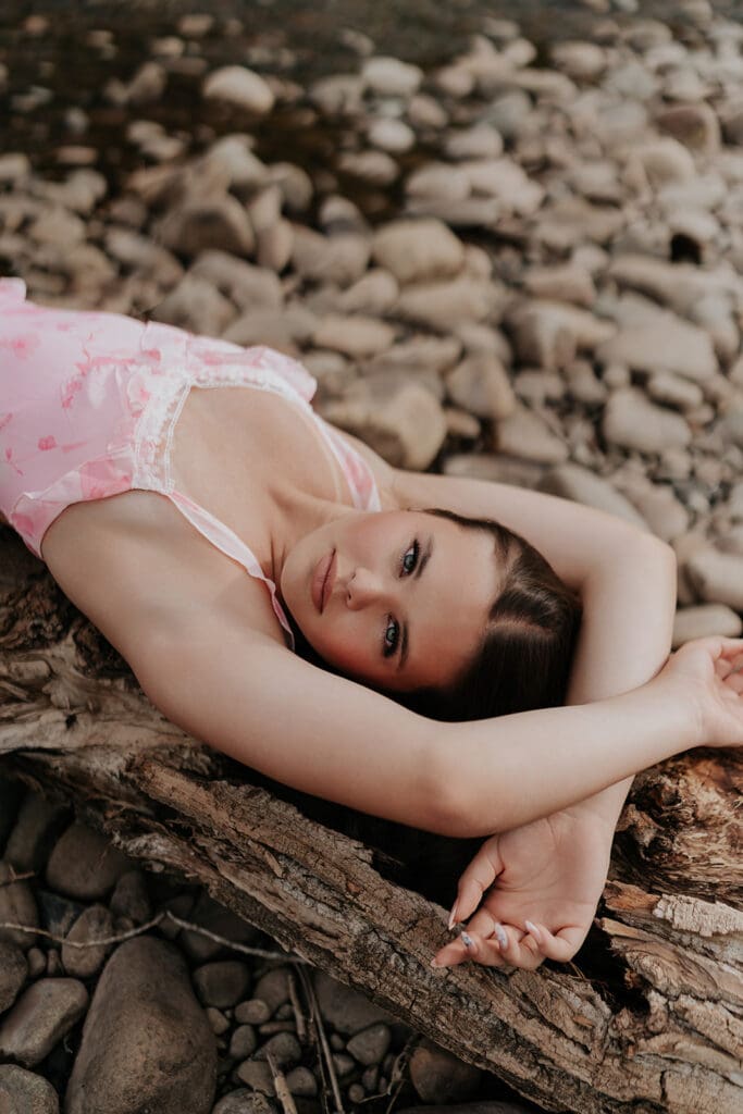 Senior portrait showcasing soft natural lighting and a relaxed outdoor vibe.